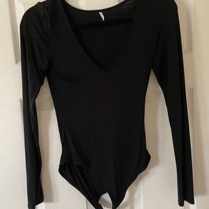 Low scoop long sleeve body suit